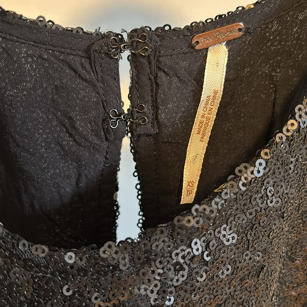 Free People black sequin liquid shine drop waist mini dress. - Picture 7 of 11